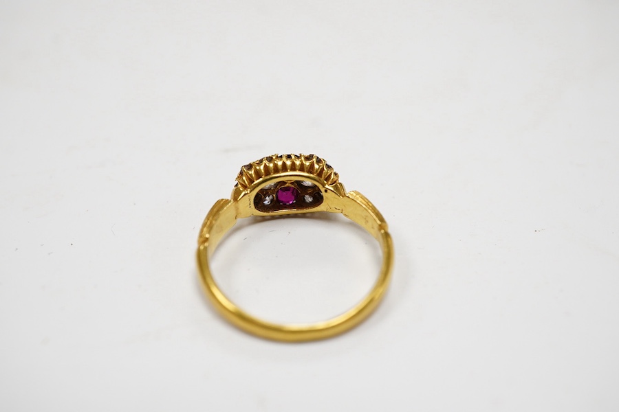 An early 20th century 18ct gold, ruby and diamond cluster ring, size J, gross weight 2.6 grams. Condition - fair